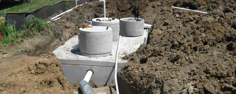 Septic system repair and installation site with tank access ports in Los Angeles, CA